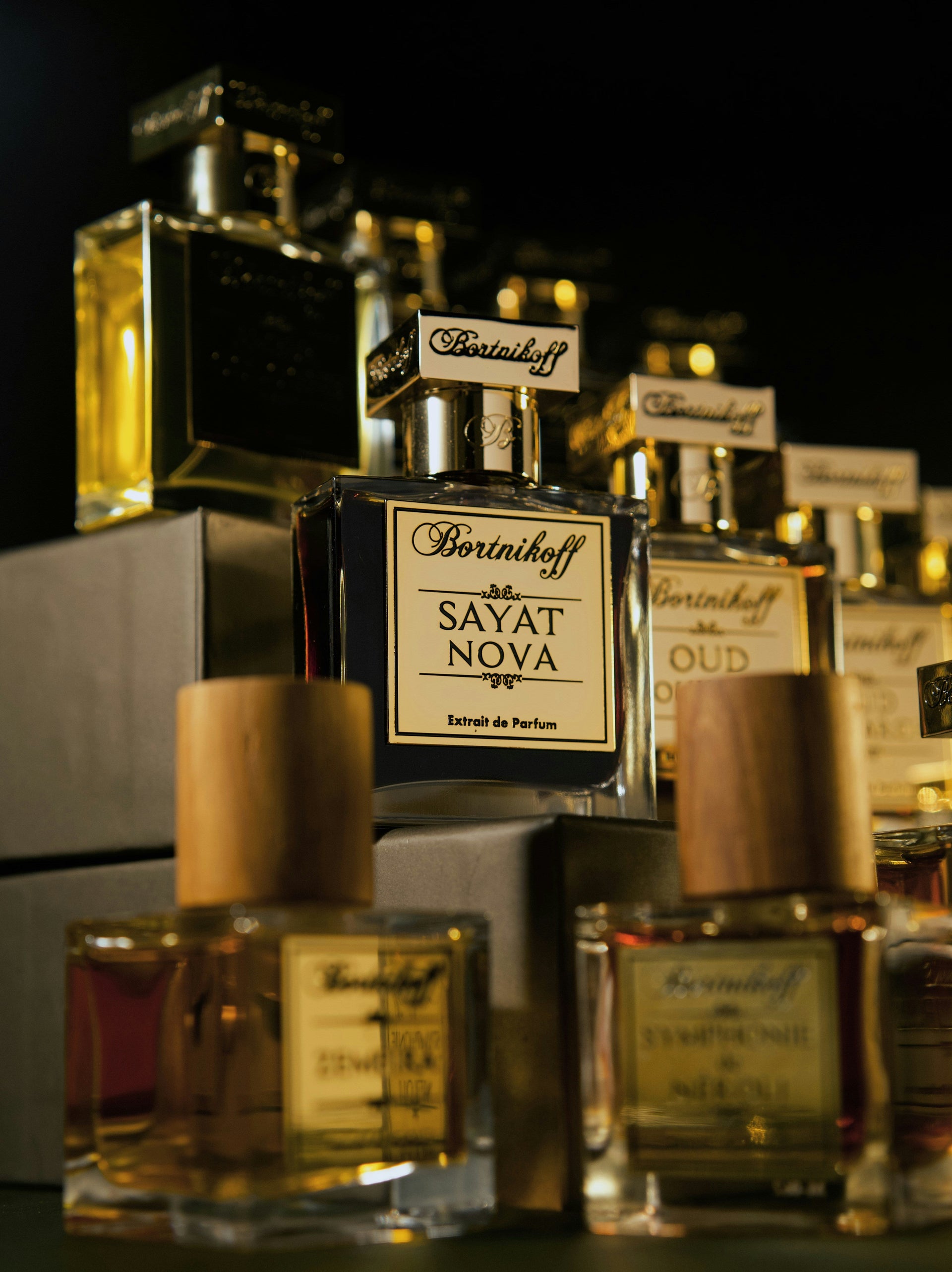 Top luxury designer perfumes including Chanel No.5, Dior Sauvage, Tom Ford Black Orchid, Gucci Bloom, YSL Libre, Valentino Donna Born In Roma, Louis Vuitton Stellar Times, and Prada La Femme — showcasing floral, spicy, woody, and fresh fragrance notes.