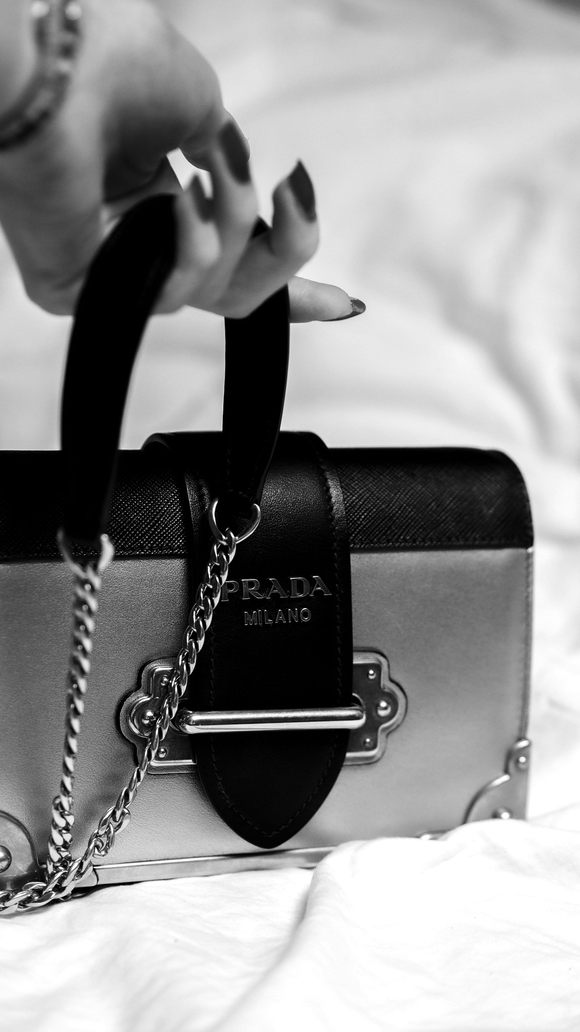 Luxury handbags from top designer brands including Louis Vuitton, Chanel, Gucci, Prada, and Balenciaga—featuring premium leather, signature details, and elegant craftsmanship.