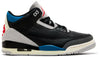 Air Jordan 3 Retro OG 'Rare Air' 2025 black leather sneaker with grey suede overlays, blue and red accents, and Nike Air heel branding.

