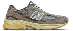 New Balance 2010 'Grey Day 2025' sneaker in grey suede and mesh with molded 'N' logo and cream ABZORB midsole.