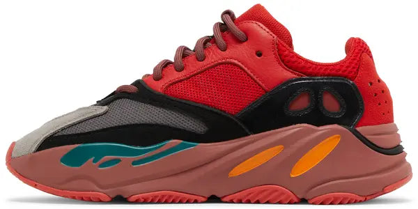 Yeezy Boost 700 ‘Hi-Res Red’ sneaker with red mesh and suede upper, maroon Boost midsole, and multicolor accents.