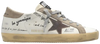 Golden Goose Wmns Superstar sneaker in white leather with taupe suede star and cinder heel, featuring a pre-distressed sole.