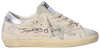 Golden Goose women's Superstar sneaker in white leather with grey suede star and silver heel tab, distressed sole design.

