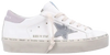 Golden Goose Women's Hi Star sneaker in white leather with silver star, lilac suede heel, and distressed platform sole.

